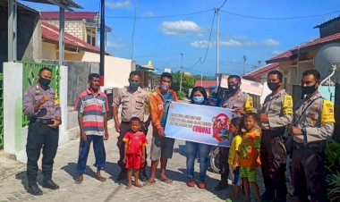 Bhabinkamtibmas-Polsek-Alak-Melaksanakan-Patroli-Sekaligus-Himbauan-Terkait-Pencegahan-Virus-Corona-di-Wilayah-Hukum-Polsek-Alak