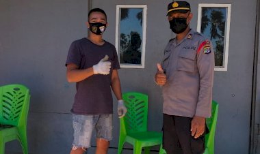 Bagikan-Masker-Gratis,-Personel-Ditbinmas-Polda-NTT-Sambangi-Warga-Kelurahan-TDM